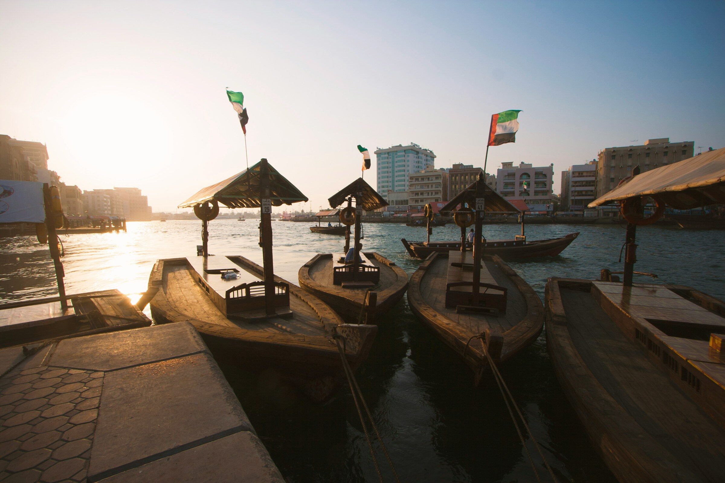 A wooden boat dock on Dubai Creek