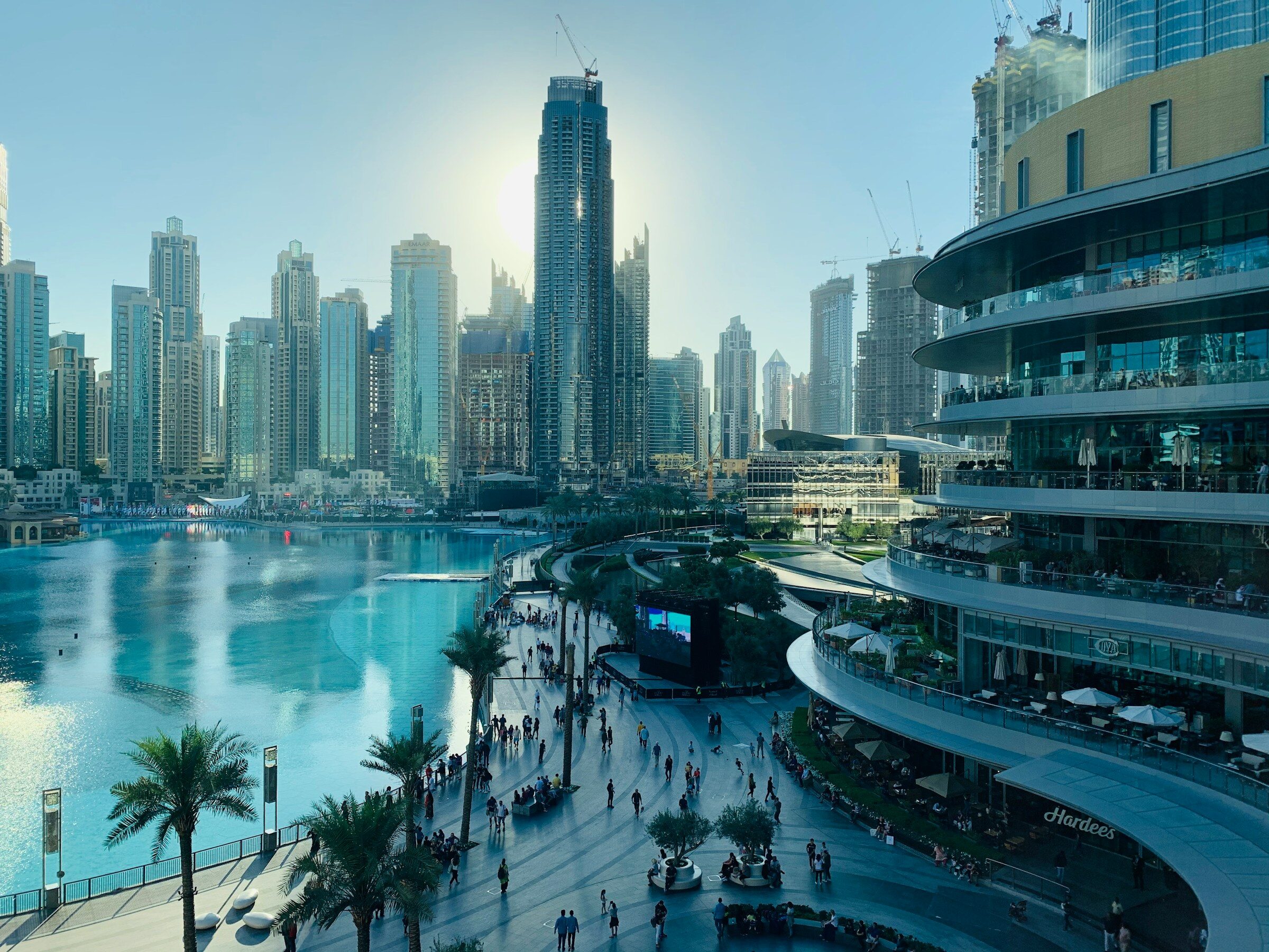 People walking near the high-rises of Dubai Marina