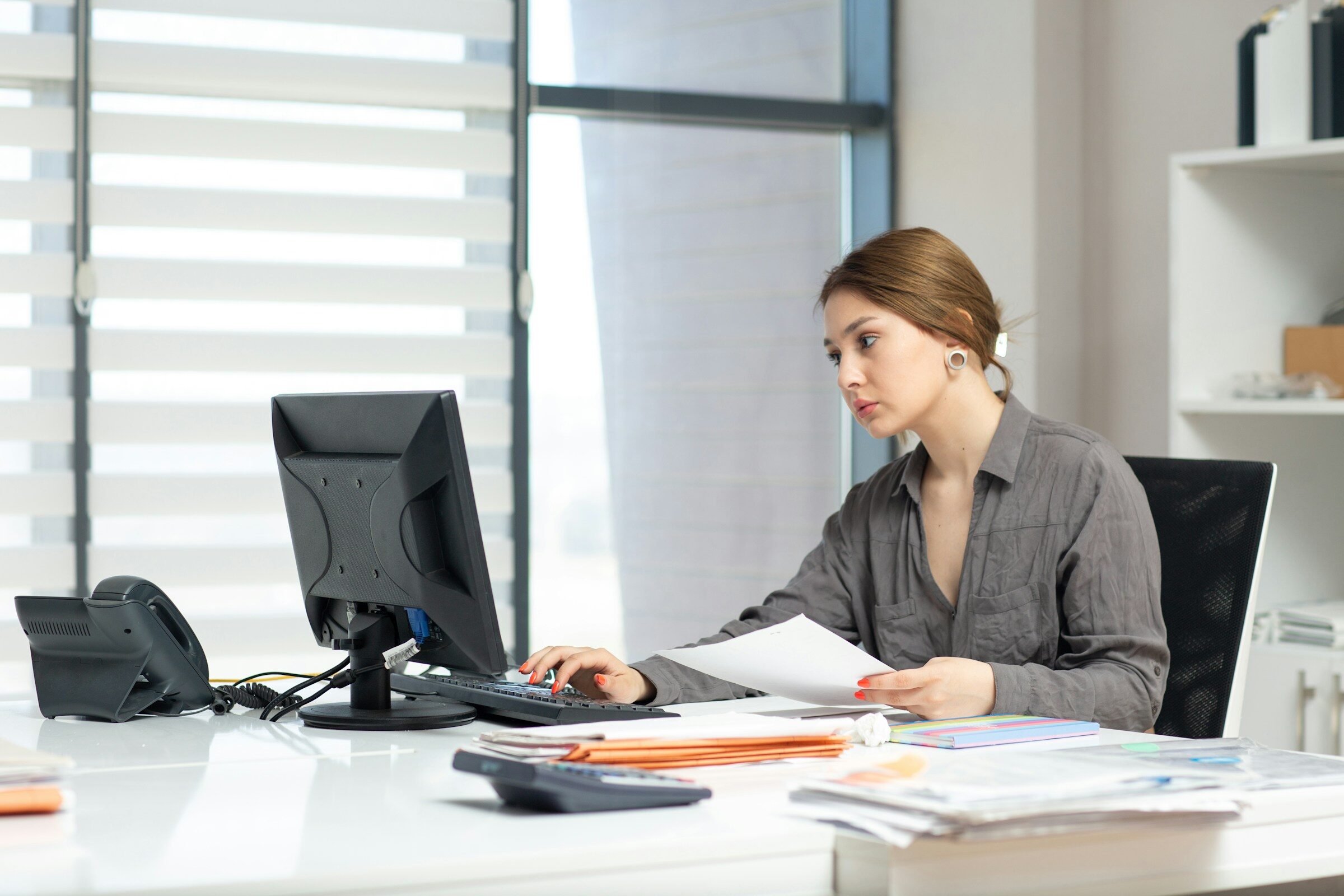 Working through the accounts at an office desk
