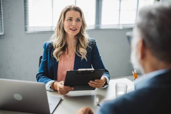 Business owner and consultant working through an ERP requirements checklist