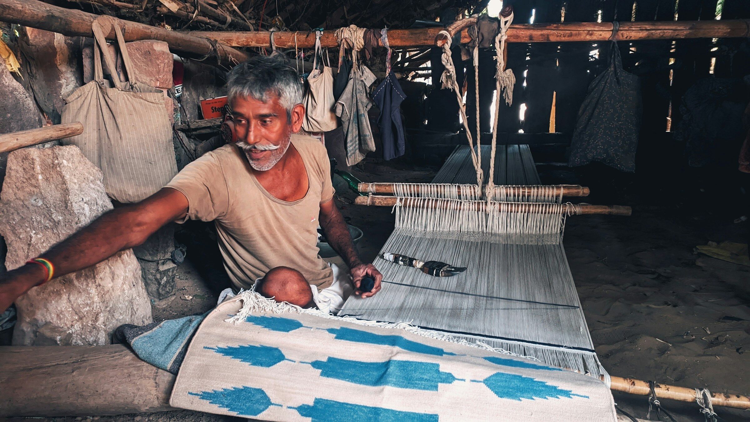 Weaving cloth on a handloom