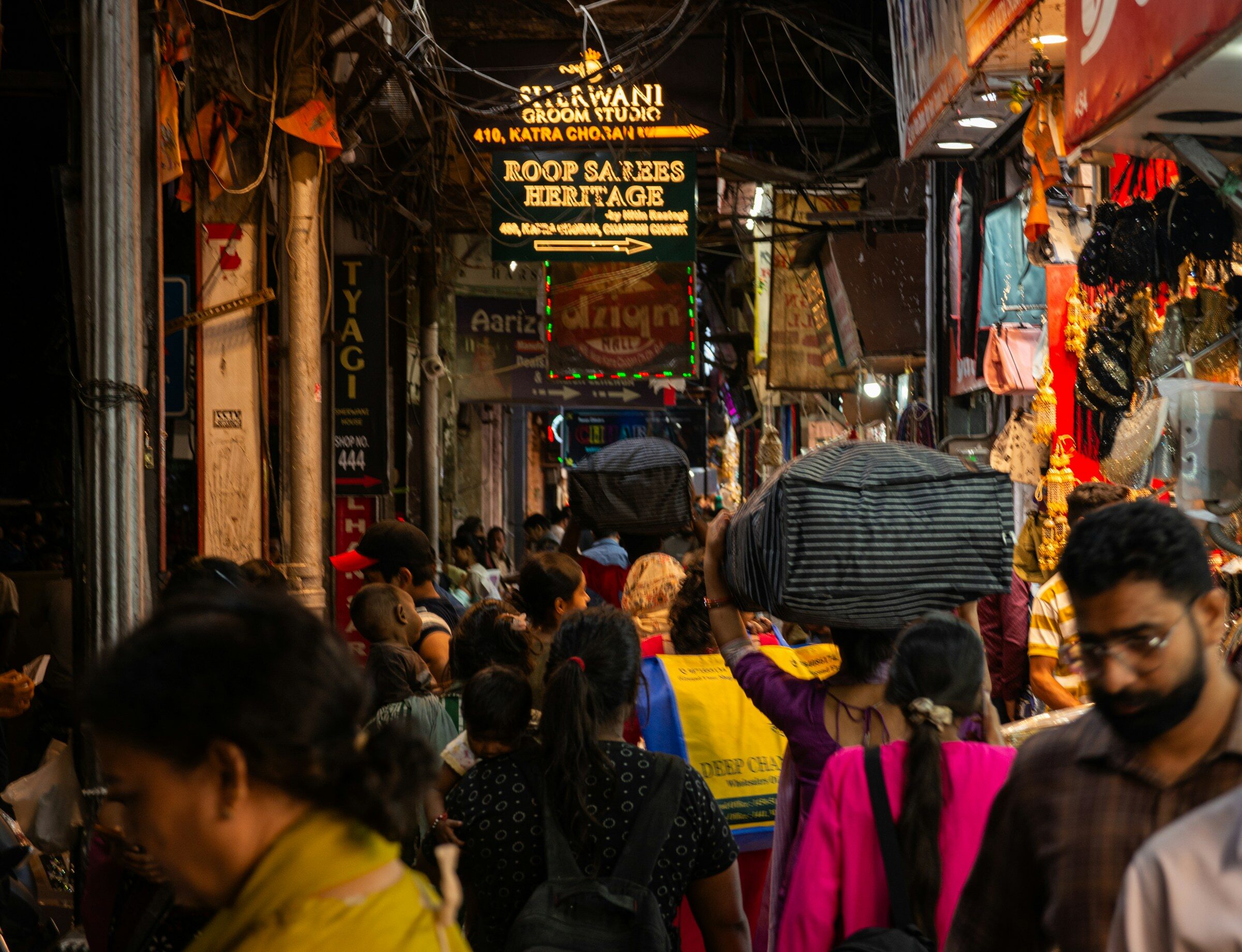 A crowded street market at night