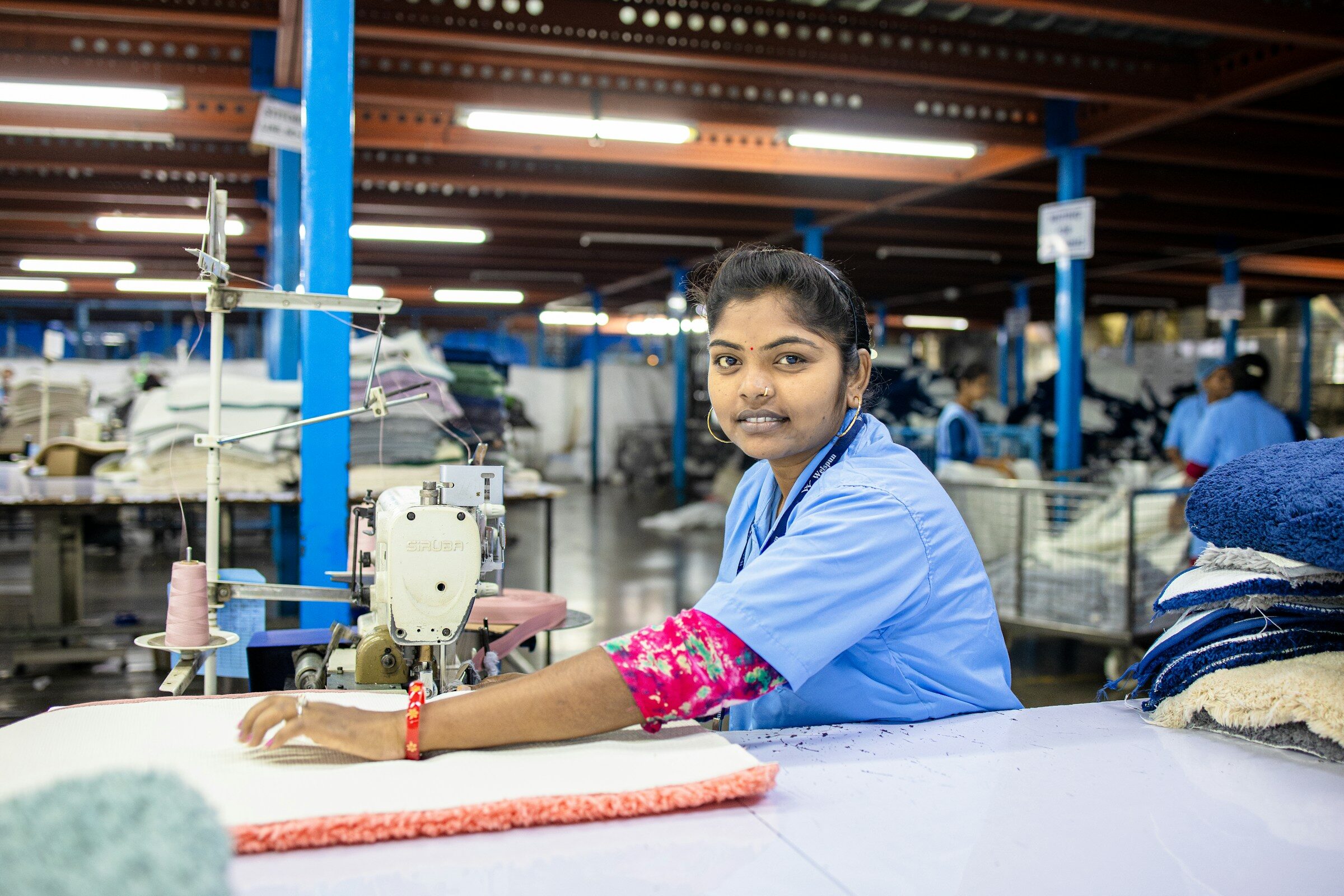 A seamstress at work in a textile factory