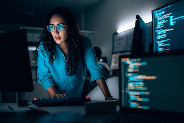 Developer debugging site rendering across two monitors