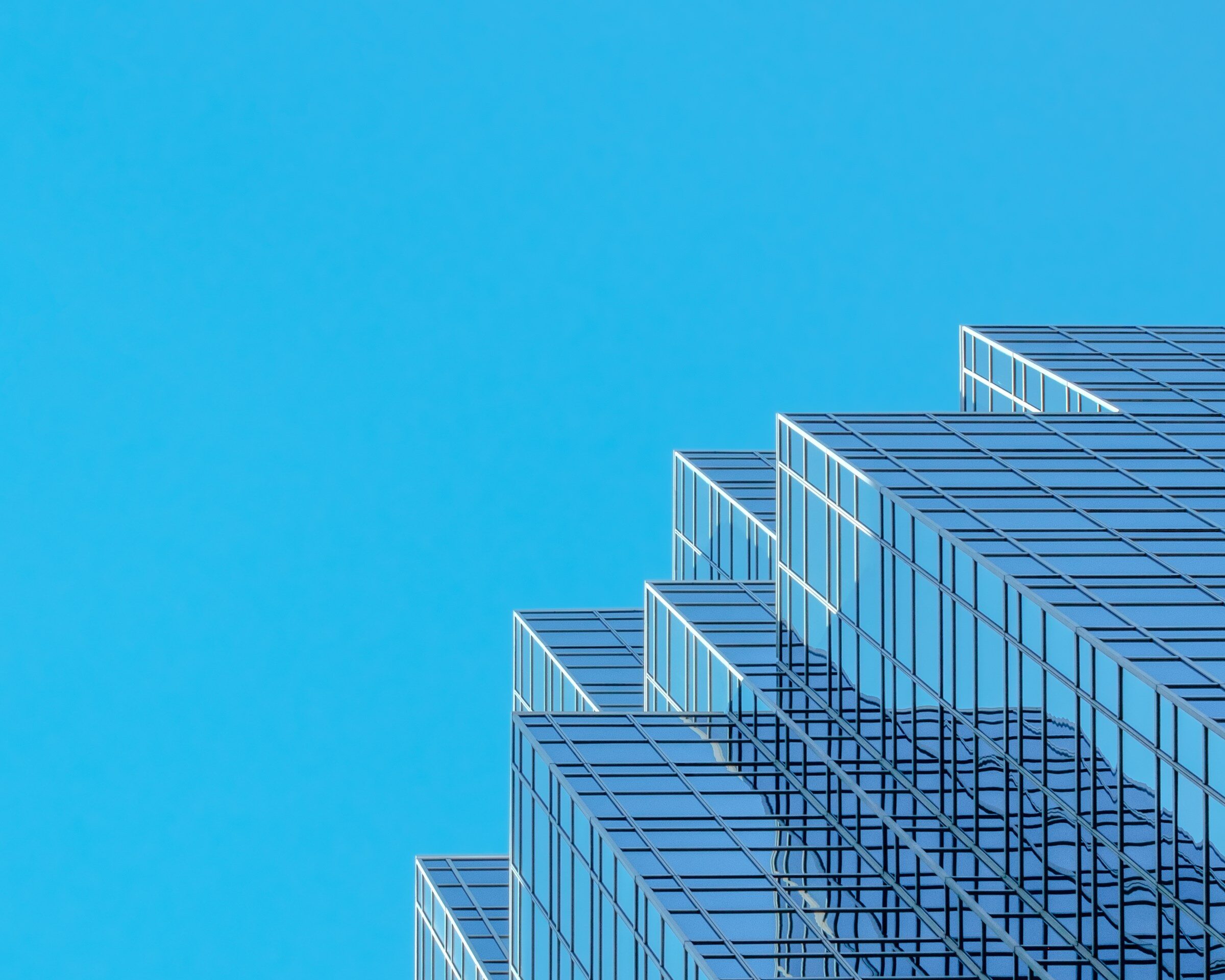 A tall office building, the scale at which SEO becomes a governance problem