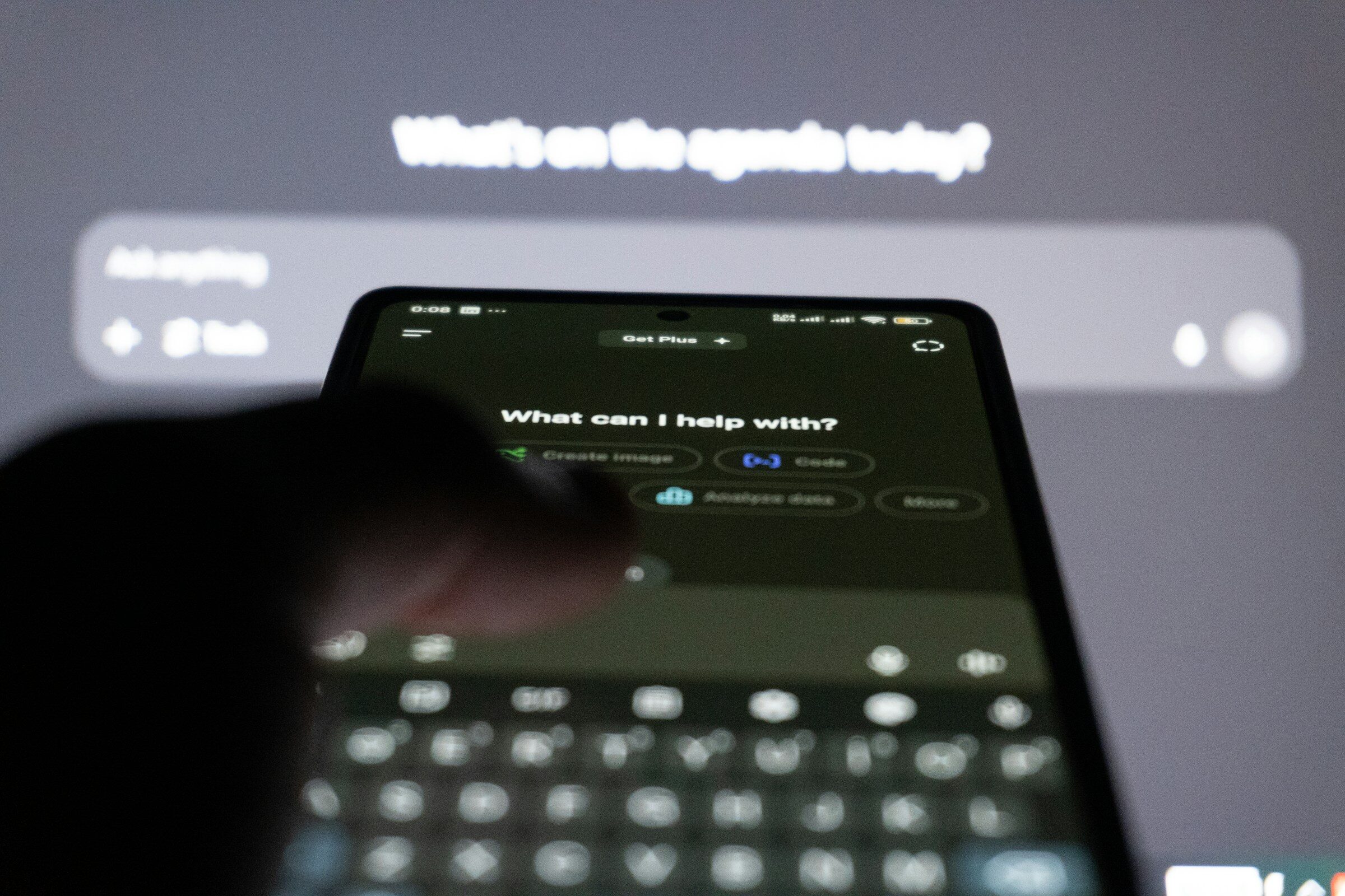 Typing a question to an AI assistant on a phone