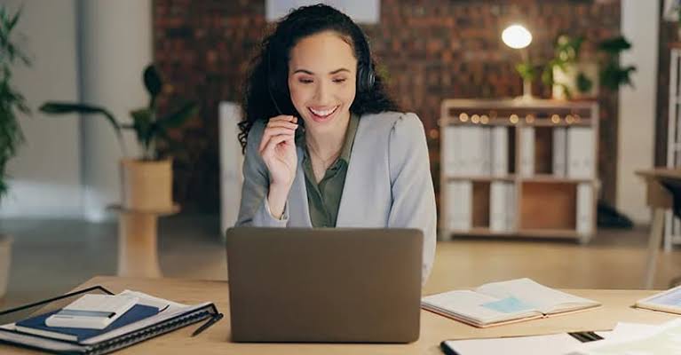Service business staff member booking a customer call