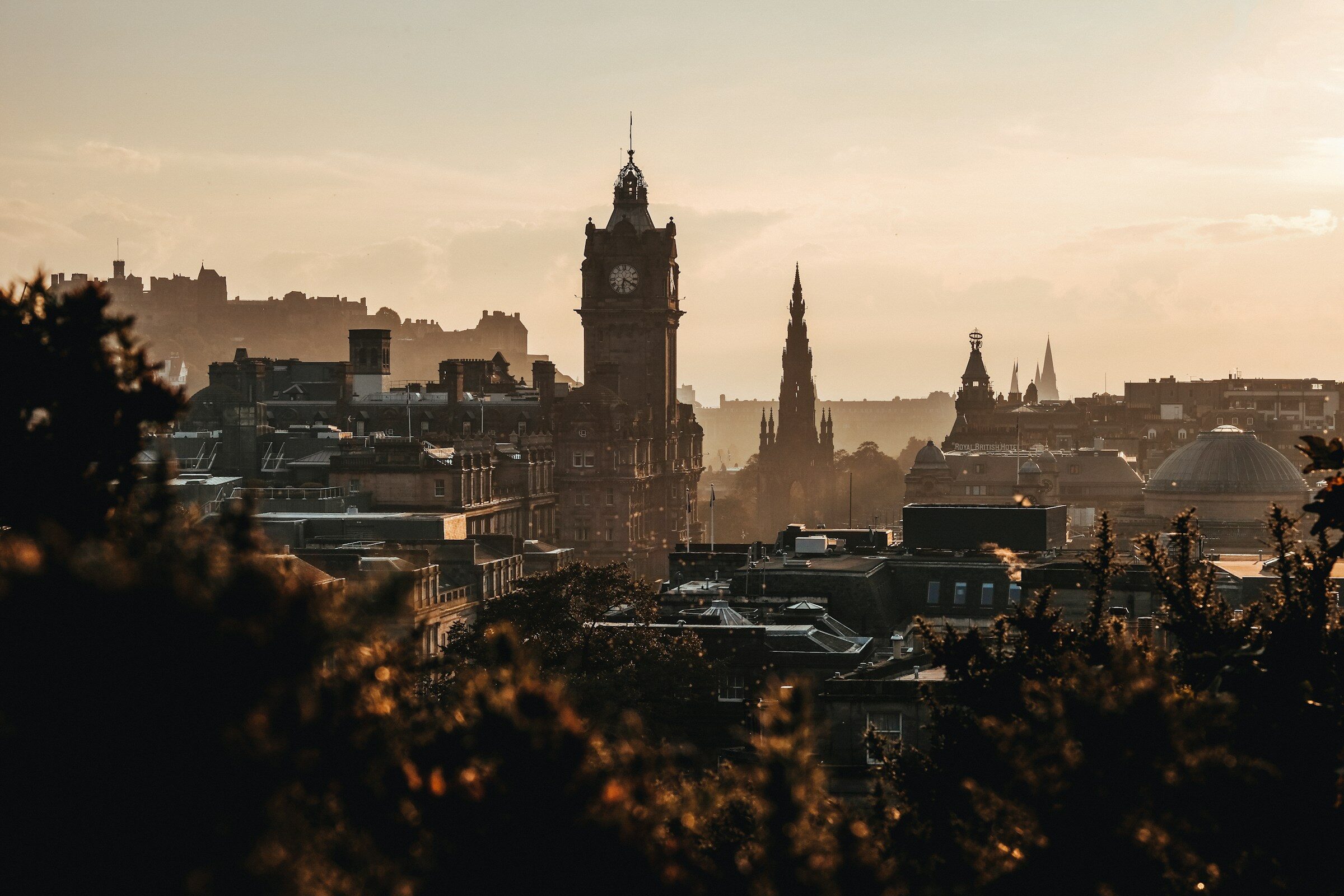 The Balmoral clock tower and Scott Monument in Edinburgh