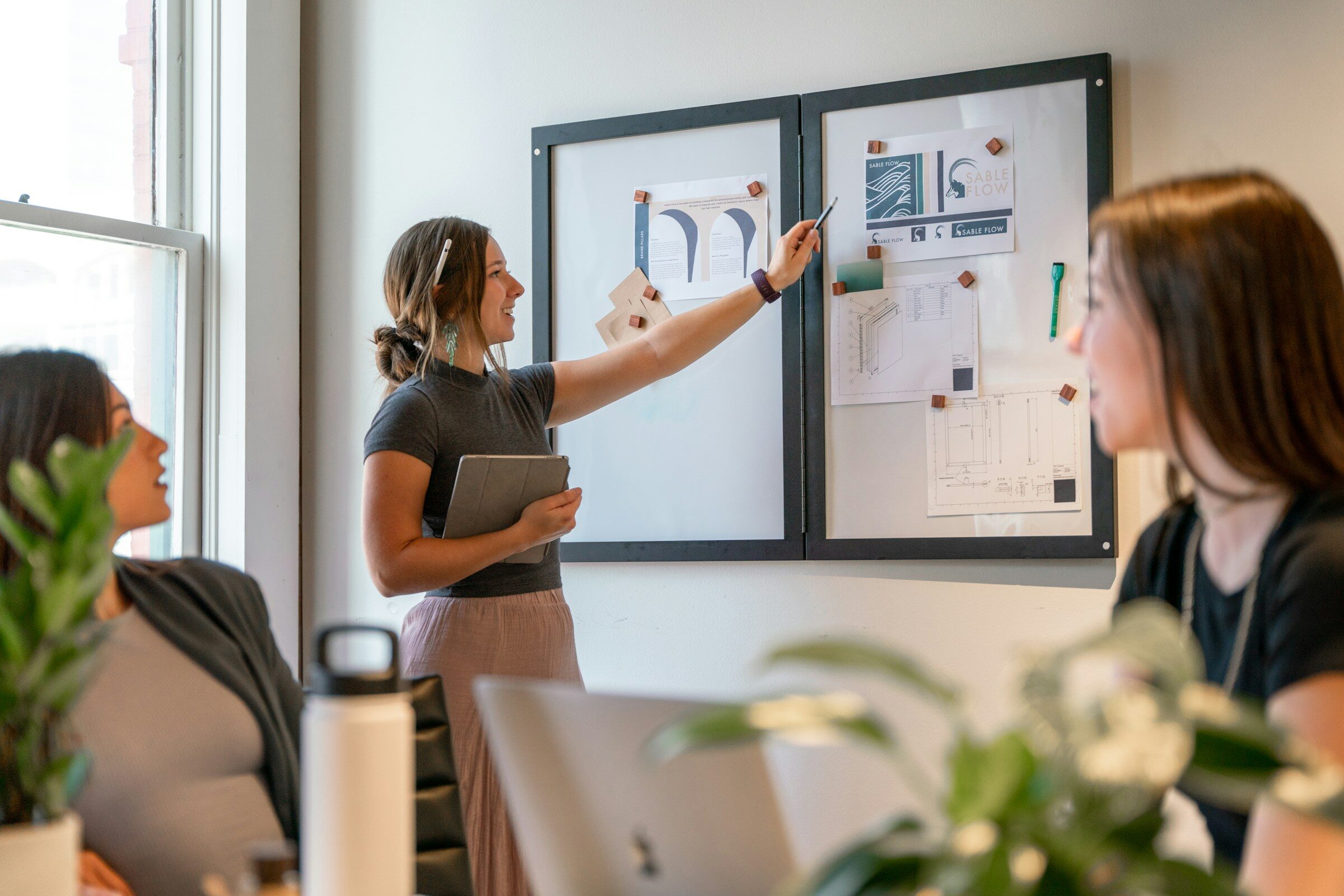 A delivery team working through an implementation plan together