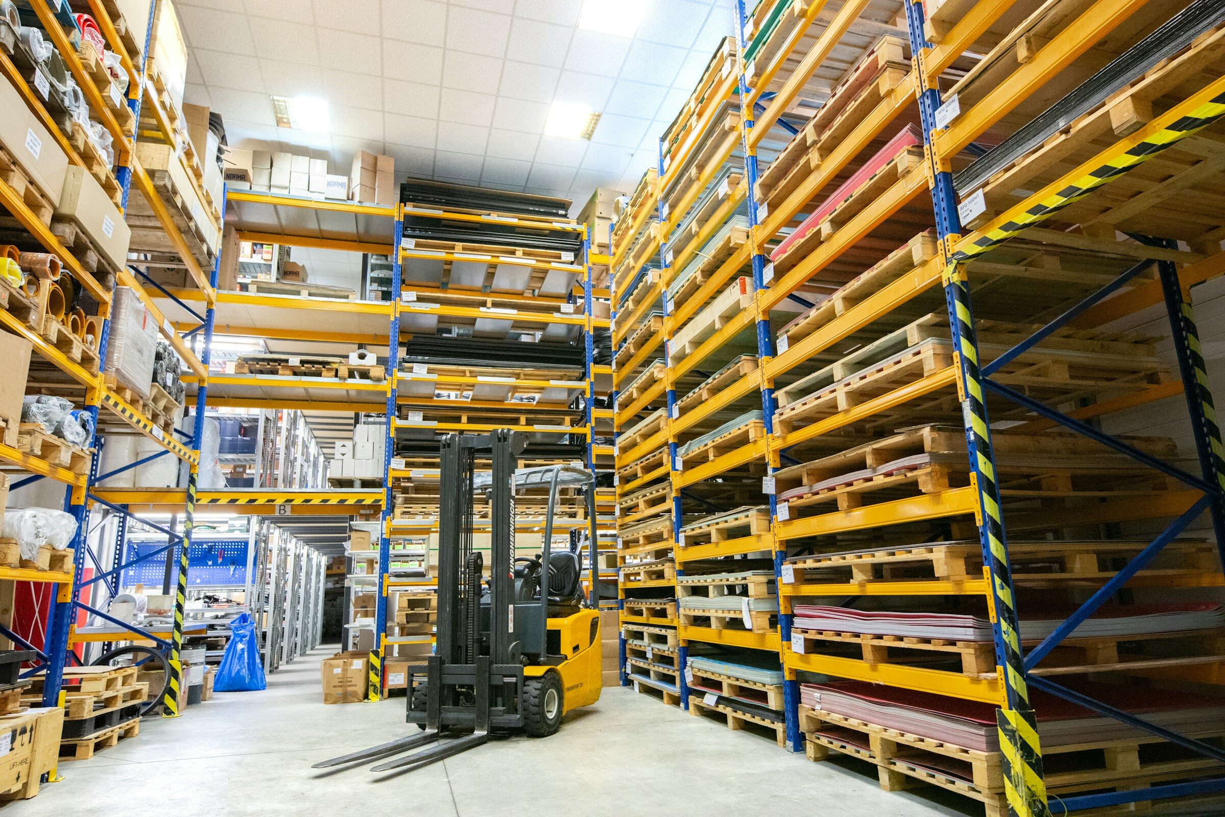 Pallet racking across a working warehouse