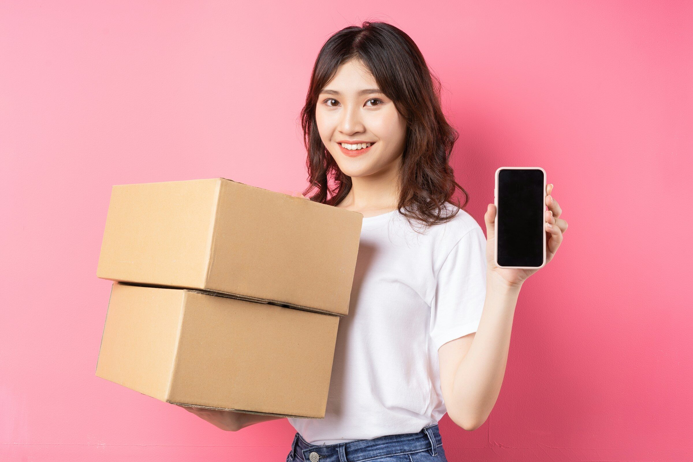 A parcel and a phone — the moment an ecommerce build is judged
